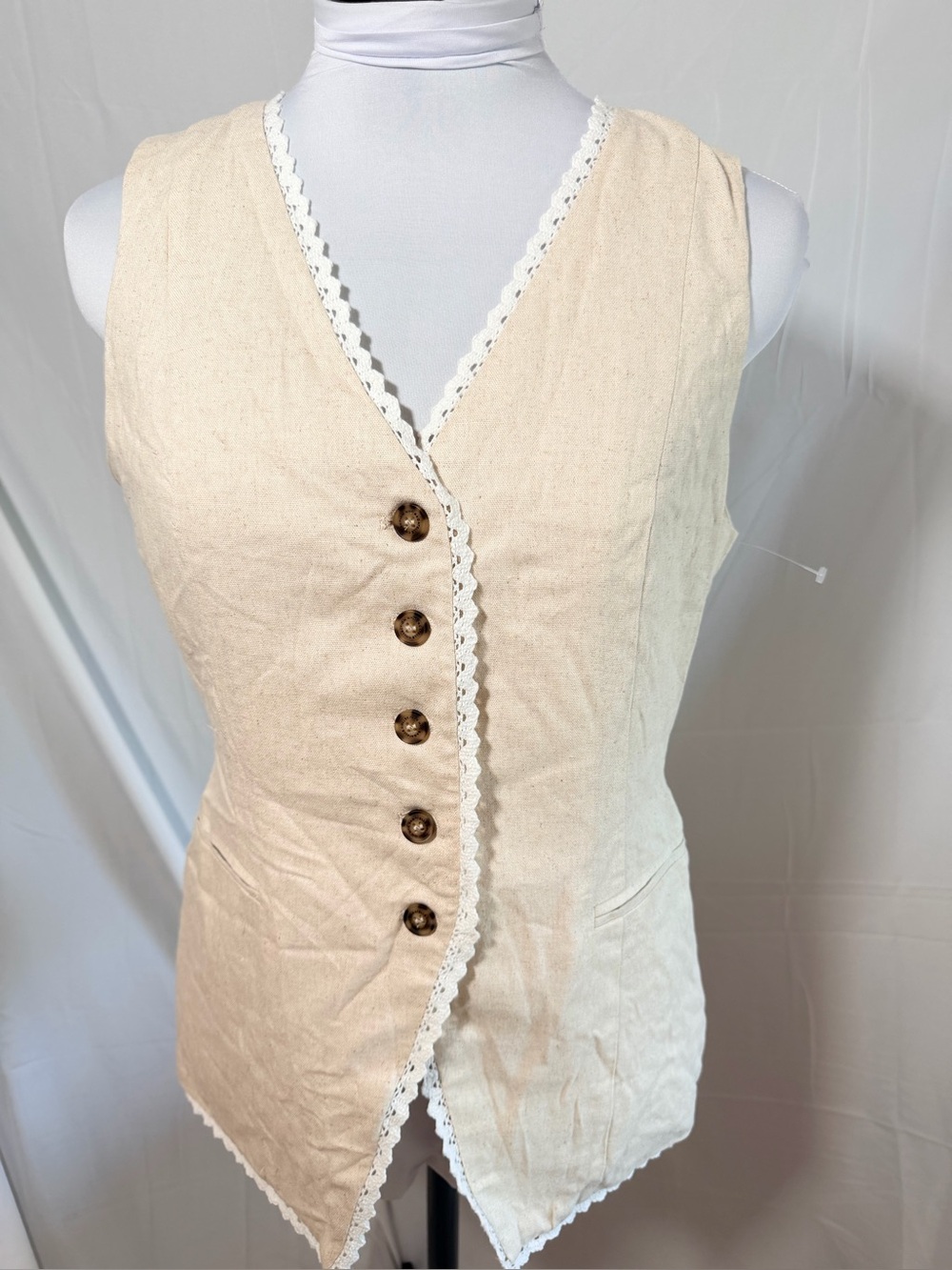 Bagatelle Collection Linen-Blend Button Vest in oatmeal/beige.